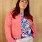 Veste en jean grande taille corail : une pièce vibrante et moderne, idéale pour apporter une touche de couleur et de style à votre garde-robe.