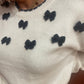 Pull blanc avec nœuds papillon