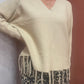 Pull beige à franges