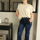 "Jean flare brut : style rétro chic. Ce jean à la coupe évasée et au denim brut offre une silhouette allongeante et élégante. Inspiré des années 70, il ajoute une touche de vintage à votre tenue tout en restant moderne et polyvalent, parfait pour un look à la fois décontracté et sophistiqué."
